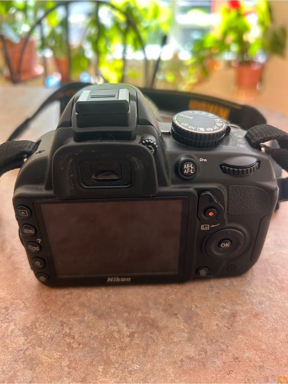 Nikon Black 3100 DSLR Camera with Zoom Lens and Branded Strap